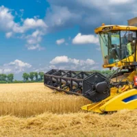 depositphotos_408417220-stock-photo-grain-harvesting-combine-sunny-day