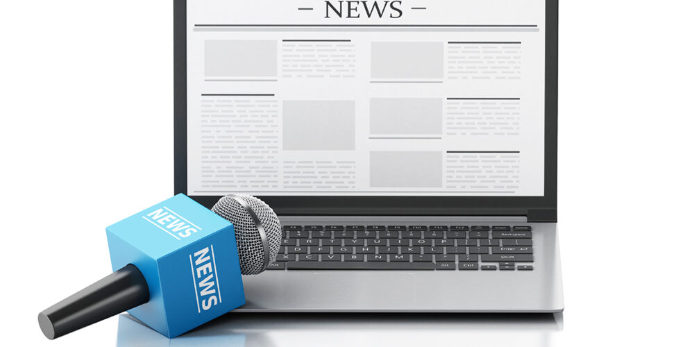 3d renderer image. News microphone and laptop with news article. Isolated white background.